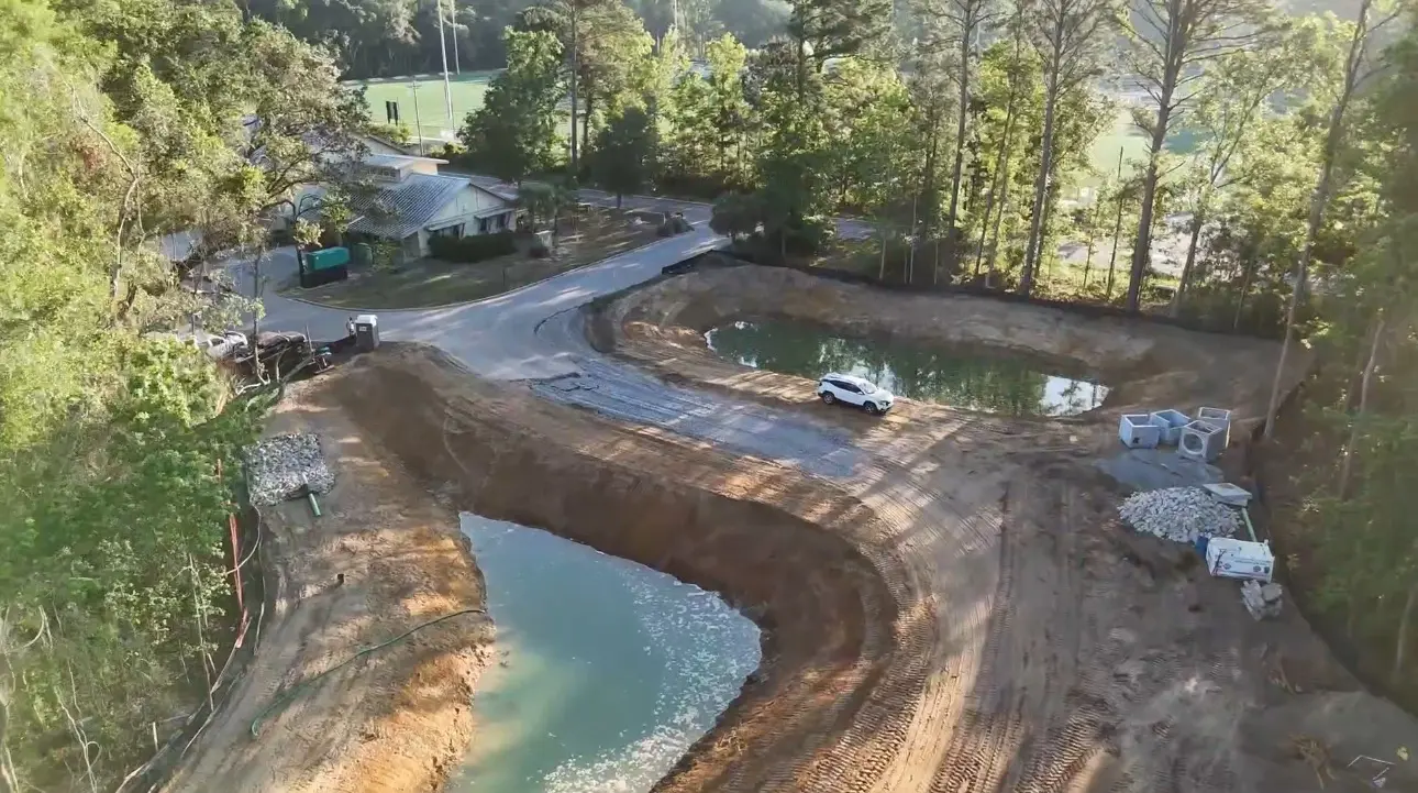 Detention pond and surrounding grading on a Charleston-area sitework project